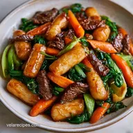 Stir-Fried Rice Cakes with Beef and Bok Choy
